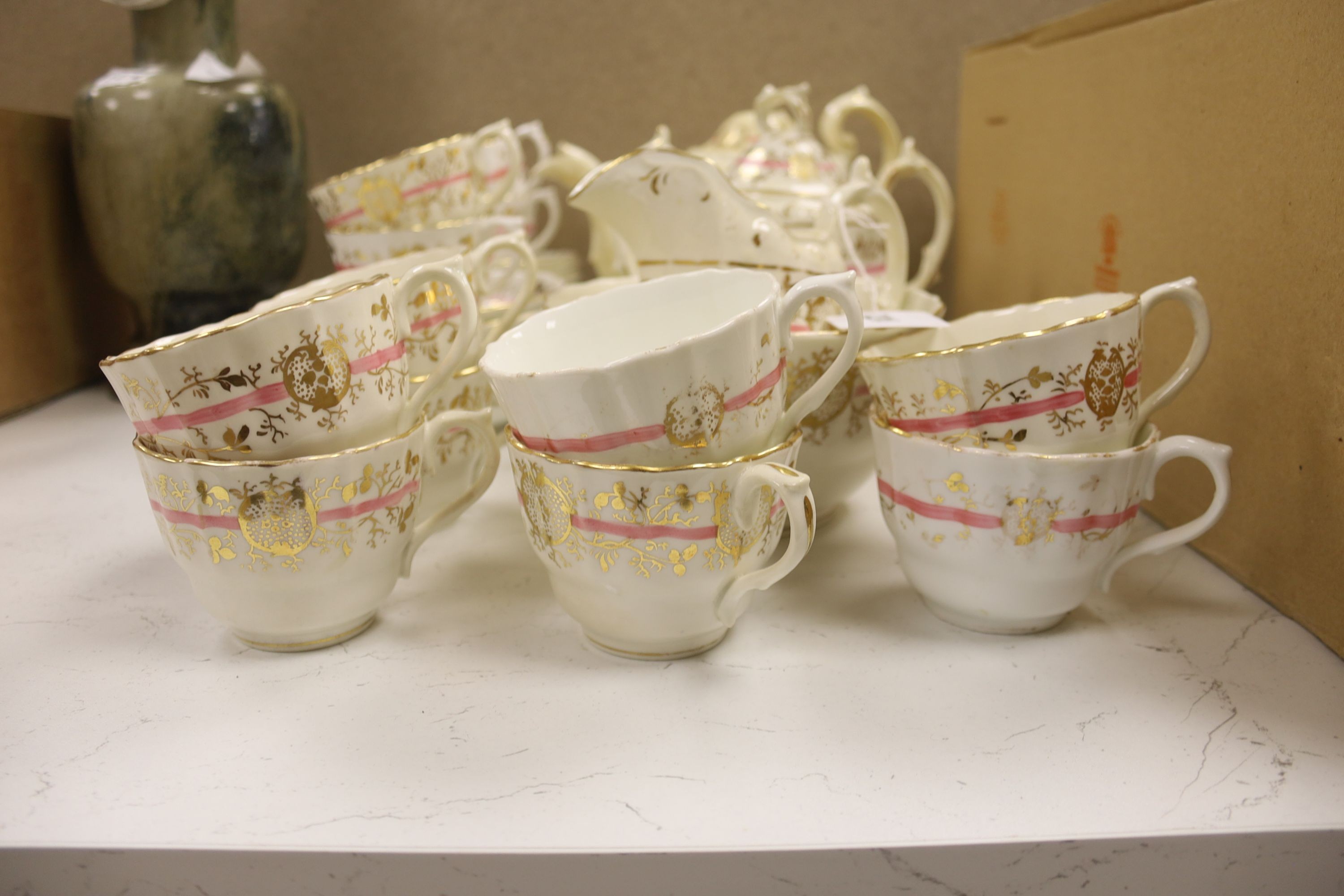 A Rockingham type part tea set